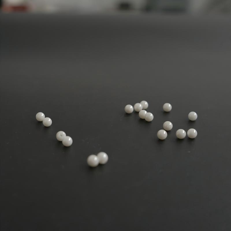Spherical ceramic wire-insulating bead