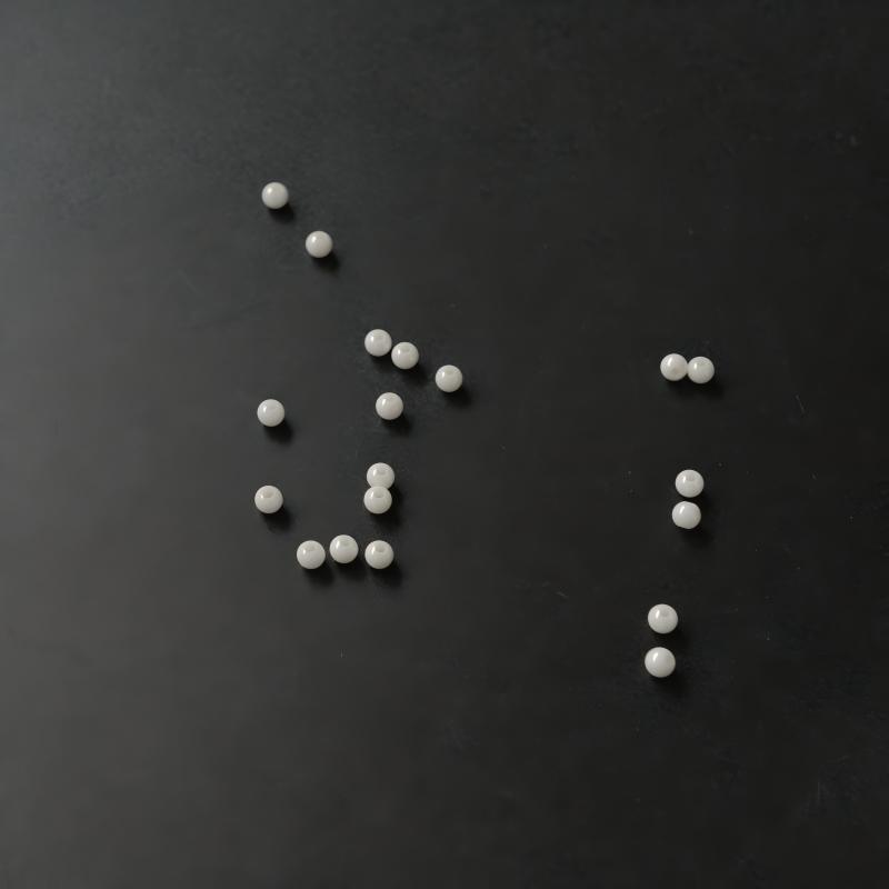 Spherical ceramic wire-insulating bead