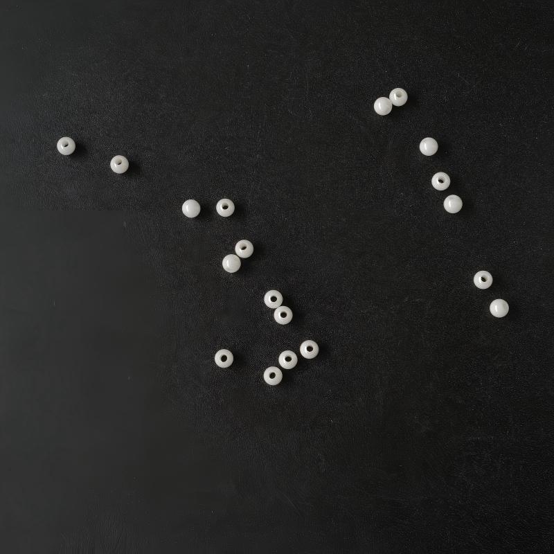 Spherical ceramic wire-insulating bead